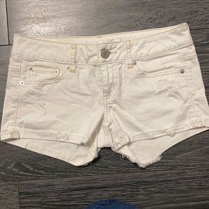 Cream size 2  (3 inch inseam) American Eagle low rise jean stretch shorts.